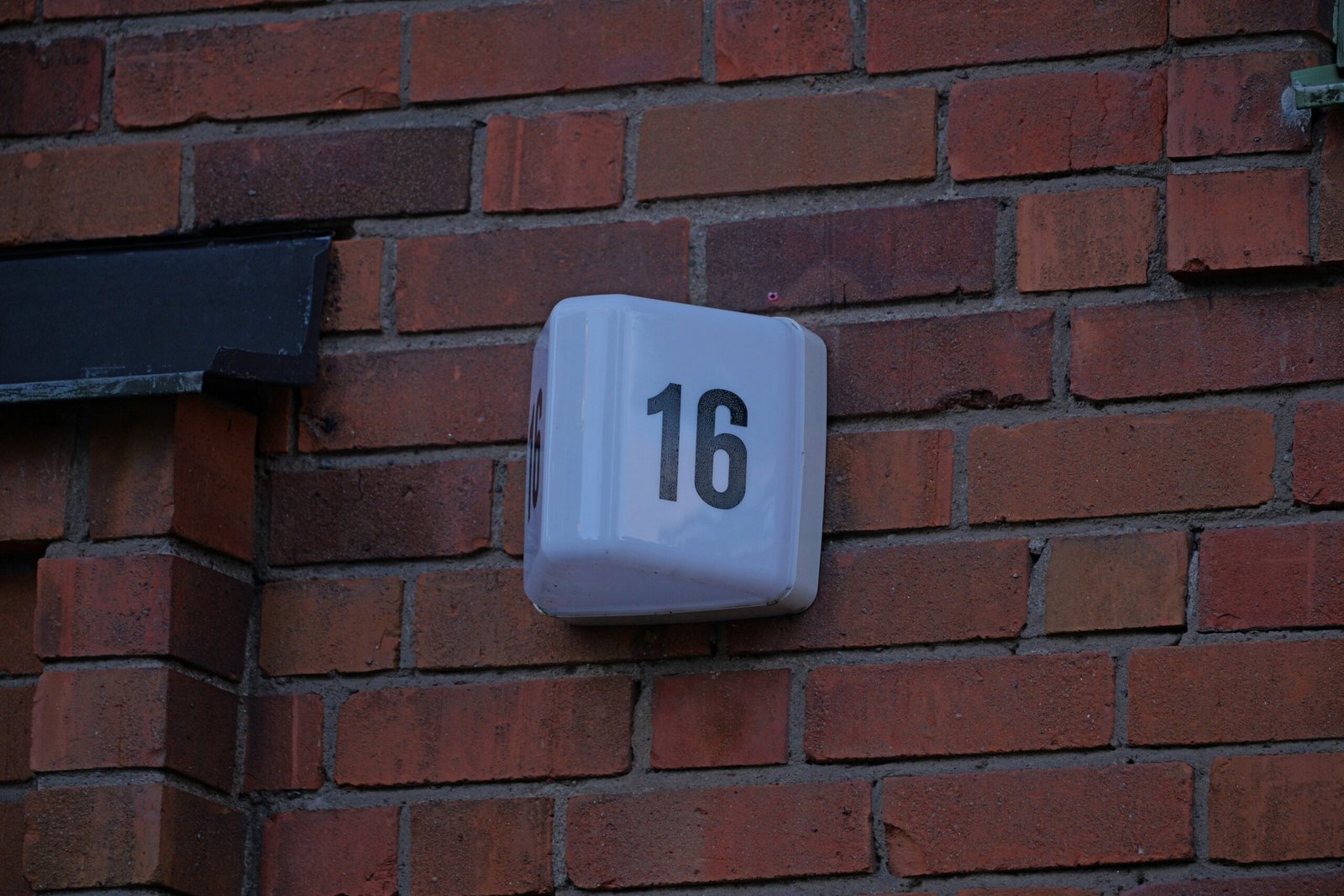 a close up of a close up of a brick wall with a clock on it